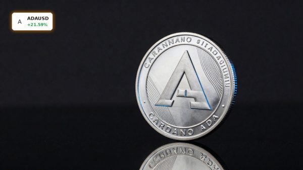 Cardano Upgrade highlighted by premium ADA coin on dark background amid whale-driven rally