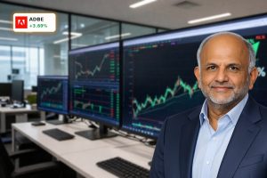 Adobe Buyback drives tech stock higher as traders watch a sharp price rebound on trading screens.