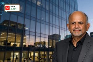 Adobe AI Strategy visualized by modern Adobe headquarters with subtle AI data patterns