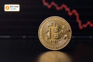 Physical bitcoin under dramatic red lighting symbolizing Bitcoin Price Plunge and renewed crypto market stress
