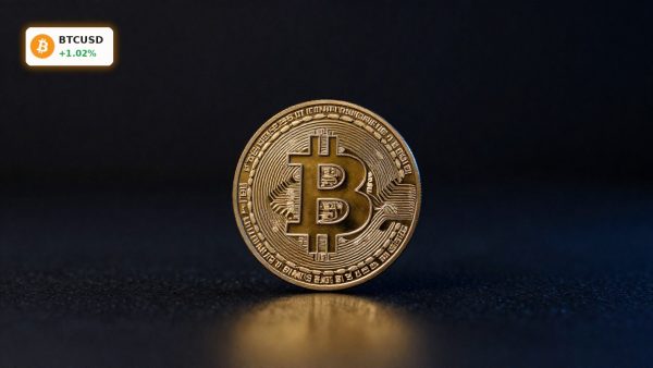 Bitcoin Crypto Adoption highlighted by a premium Bitcoin coin on dark background amid retail and institutional momentum