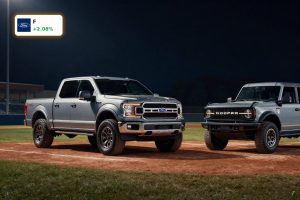 Ford MLB partnership trucks and SUVs showcased on a baseball field under stadium lights