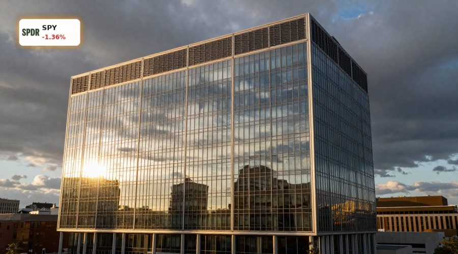 Modern corporate tower at sunset symbolizing Federal Reserve Rate Decision amid oil shock risk
