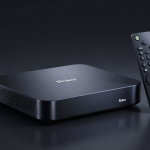 Fox Roku Acquisition spotlight on Roku streaming device and remote in premium dark studio setting