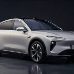 NIO Earnings highlighted by a premium NIO electric SUV in dramatic studio lighting