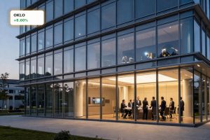 Oklo Leadership Changes reflected in a modern nuclear energy headquarters at dusk