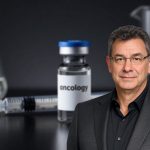 Pfizer Lung Cancer Trial oncology drug vial and syringe in dark cinematic pharmaceutical product shot