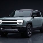 Rivian R2 Deliveries focus on the Rivian R2 electric SUV in a premium studio product shot