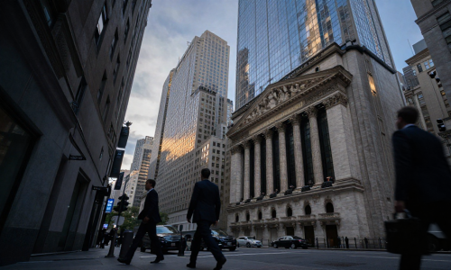 Wall Street financial district at dusk reflecting cautious U.S. Stock market mood