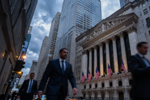 Wall Street financial district at dusk reflecting Fed-driven Stock volatility