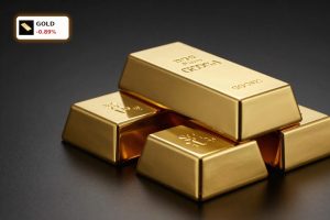 Shiny gold bars stacked in dramatic light symbolize Gold Price Record above $5,000