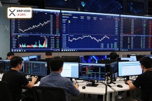 Traders analyze Ripple Q2 Outlook with XRPUSD charts, Binance margin risk and rising XRP Ledger activity on crypto trading screens